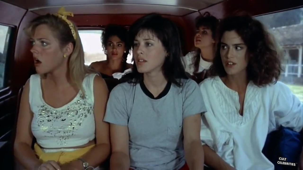 Lucinda Dickey and Rebecca Ferratti in Cheerleader Camp (1988) .