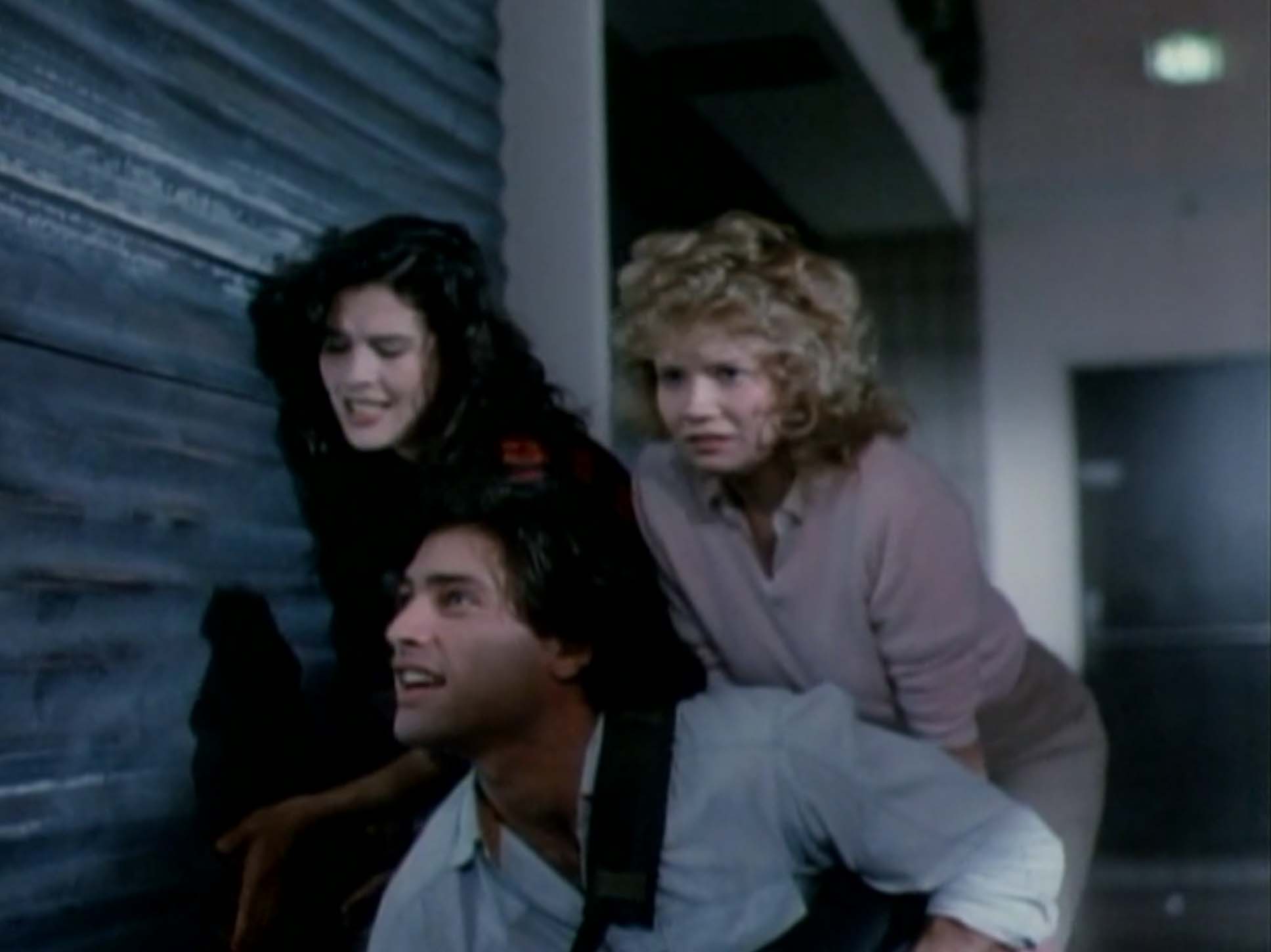 Kelli Maroney, Karrie Emerson and Russell Todd in Chopping Mall (1986)