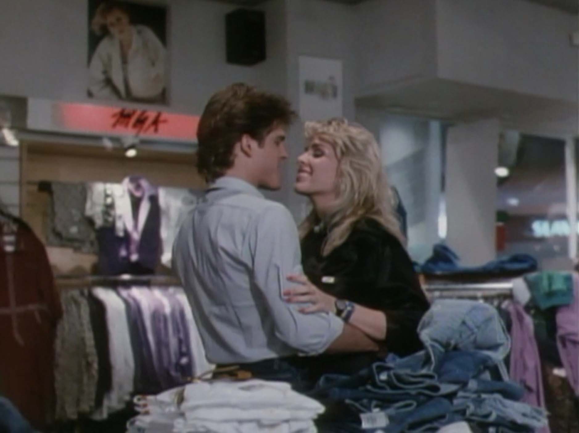John T Terlesky and Suzee Slater in Chopping Mall (1986)