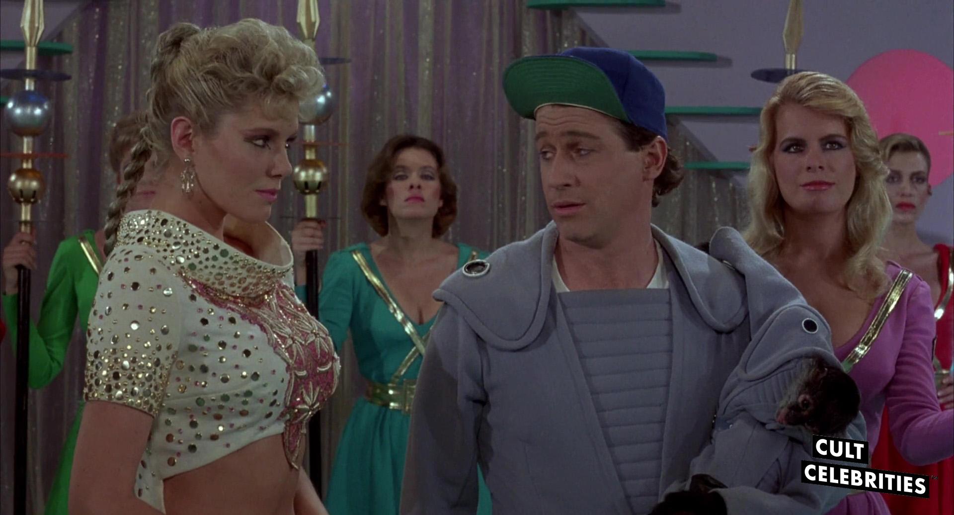 Lana Clarkson and Joey Travolta in Amazon Women on the Moon (1987)