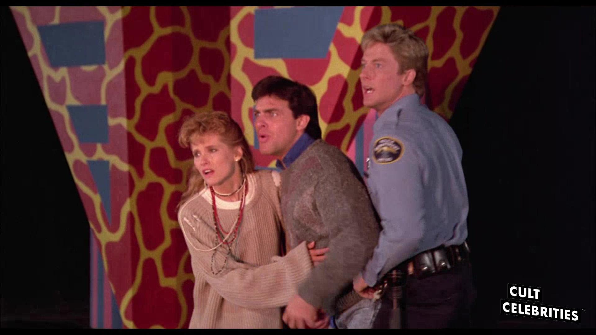 Suzanne Snyder, John Allen Nelson and Grant Cramer in Killer Klowns from Outer Space (1988)