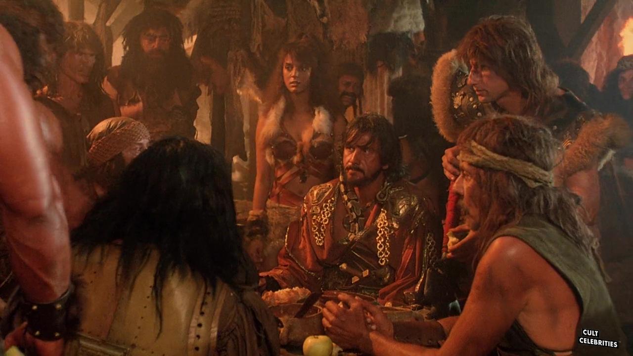 Eva La Rue and George Eastman in The Barbarians (1987)