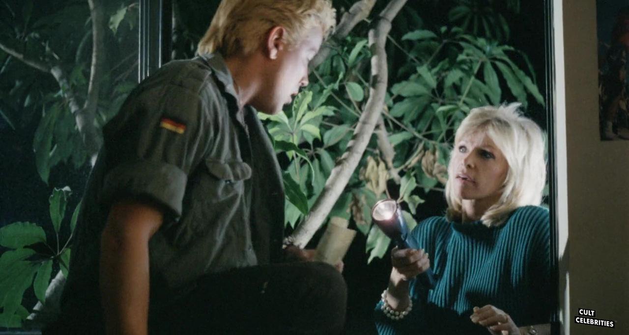 Bobbie Bresee and Tom Shell in Surf Nazis Must Die (1987)