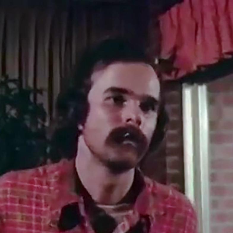 Tommy Lamey as Slick in Psycho from Texas (1975)