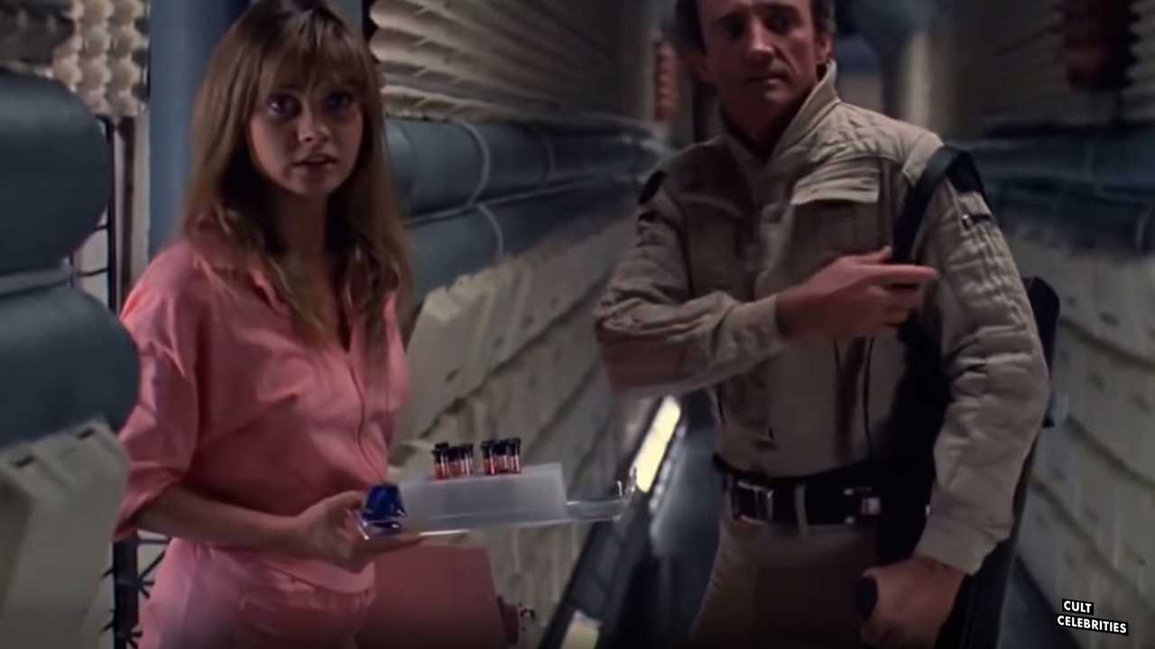 Dawn Dunlap as Tracy Baxter in Forbidden World (1982)