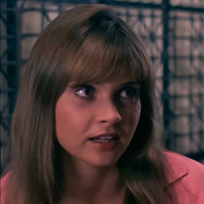 Dawn Dunlap as Tracy Baxter in Forbidden World (1982)