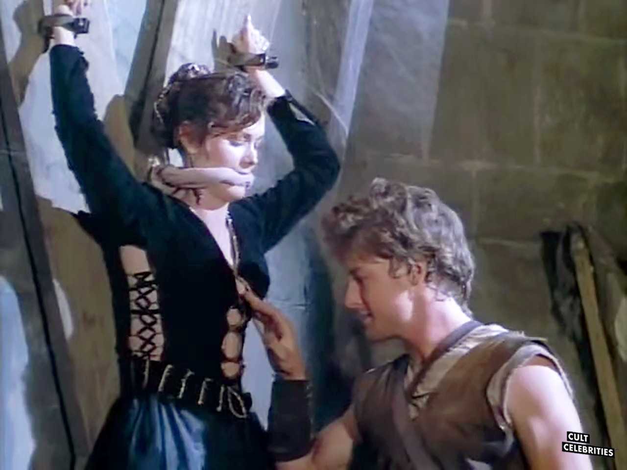 Terri Treas and John Allen Nelson in Deathstalker and the Warriors from Hell (1988)