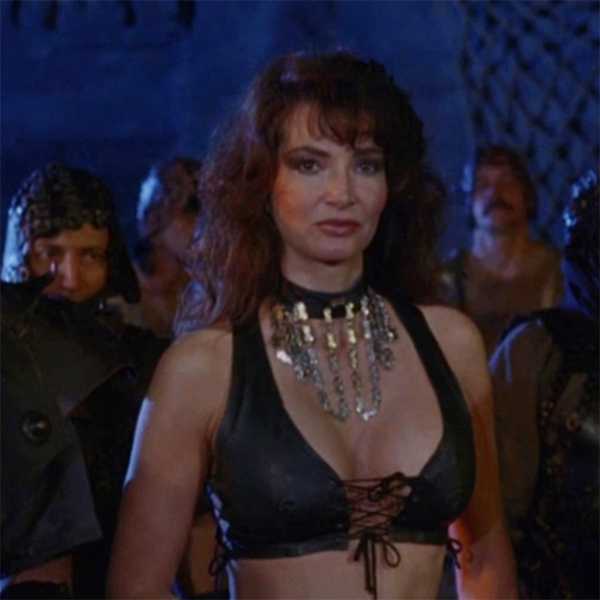 Toni Naples in Deathstalker II: Duel of the Titans (1987)