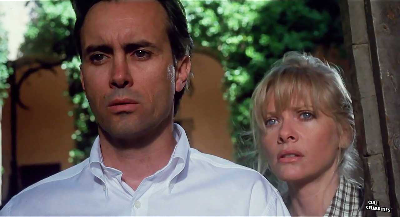 Barbara Crampton and Jeffrey Combs in Castle Freak (1995)